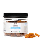 Jar of Clear Dog Treats Omega Pet Gummies with a few gummies on a white background